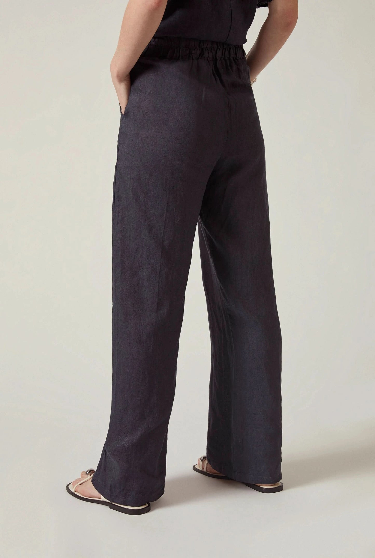 Back view of the Relaxed Navy Linen Trousers by James Lakeland with relaxed fit styling