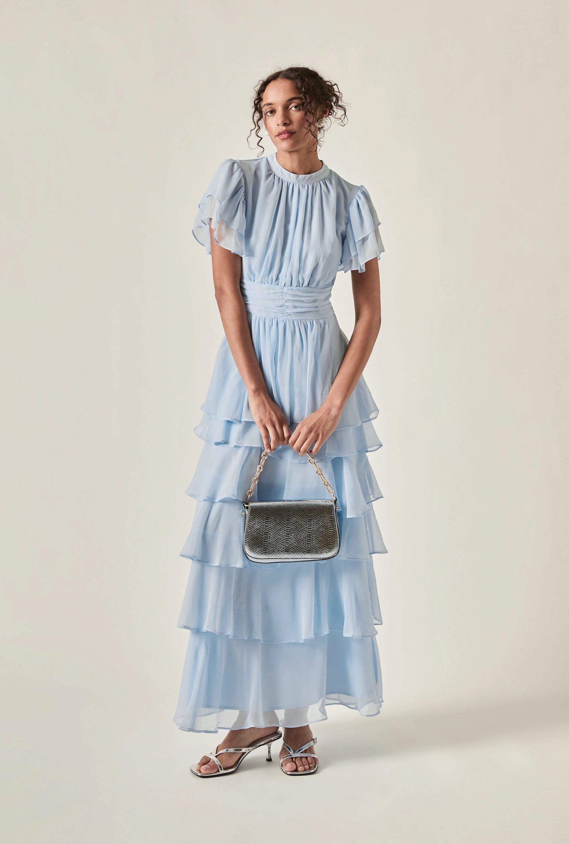 Model wearing Pale Blue Tiered Ruffle Maxi Dress – front view